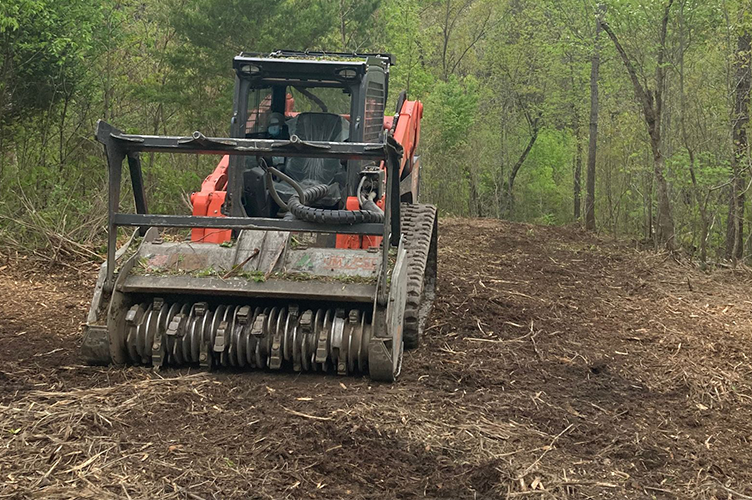 Forestry mulching equipment clearing brush